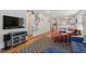 Spacious living room with hardwood floors and comfortable seating arrangement at 545 E Lenoir St, Raleigh, NC 27601