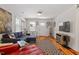 Inviting living room with hardwood floors, stylish rug, and comfortable seating at 545 E Lenoir St, Raleigh, NC 27601