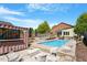 Serene backyard pool area with lounge seating, lush landscaping, and a modern design at 545 E Lenoir St, Raleigh, NC 27601