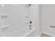 Bathroom with white shower-tub combo and grab bars at 601 Benton Dr, Oxford, NC 27565