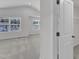 Bright bedroom with carpet, closet, and multiple windows providing natural light at 601 Benton Dr, Oxford, NC 27565