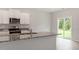 Modern kitchen with stainless steel appliances, granite counters and a breakfast bar at 601 Benton Dr, Oxford, NC 27565