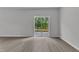 Bright and airy living room with sliding glass doors opening to the outdoor area at 601 Benton Dr, Oxford, NC 27565