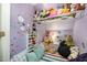 The bonus room includes a cozy reading nook and creative storage solutions at 6105 Splitrock Trl, Apex, NC 27539