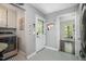 Hallway with access to a laundry area and a view into another room at 6105 Splitrock Trl, Apex, NC 27539