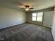 Cozy bedroom featuring neutral walls, plush carpet and a window with natural light at 70 Pate Landing Dr, Selma, NC 27576