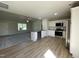 Open concept view from kitchen to living area showing modern appliances and lots of room at 70 Pate Landing Dr, Selma, NC 27576