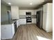 Modern kitchen design with stainless steel appliances, granite countertops, and ample cabinet space at 70 Pate Landing Dr, Selma, NC 27576