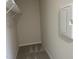 Walk-in closet with carpeted floors and wire shelving provides ample storage space at 70 Pate Landing Dr, Selma, NC 27576