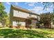 Two-story home with neutral siding, a screened-in porch, and a well-maintained lawn at 720 Raymond Dr, Clayton, NC 27527