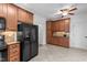 Kitchen with tile floors, stainless appliances, and ample cabinet space at 720 Raymond Dr, Clayton, NC 27527