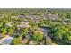 Aerial view displaying the proximity to commercial buildings, and ample green spaces at 730 N Harrison Ave, Cary, NC 27513