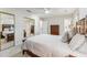 Spacious bedroom with ample natural light and mirror sliding closet doors at 730 N Harrison Ave, Cary, NC 27513