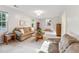Bright living room with a cozy seating area and a view of the outdoors at 730 N Harrison Ave, Cary, NC 27513