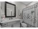 This cozy bathroom features clean fixtures, great decor, and a shower with a decorative curtain at 775 Sagamore Dr, Louisburg, NC 27549