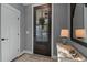 Elegant entryway featuring a decorative glass door and stylish accents at 775 Sagamore Dr, Louisburg, NC 27549