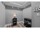 Bright, neutral entryway features modern floors, gray walls, and convenient key hooks at 775 Sagamore Dr, Louisburg, NC 27549