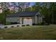 Charming home with a well-maintained lawn, two-car garage, and neatly trimmed landscaping at 775 Sagamore Dr, Louisburg, NC 27549