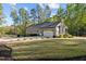 Charming single-story home boasts a two-car garage, well-manicured lawn, and inviting curb appeal at 775 Sagamore Dr, Louisburg, NC 27549