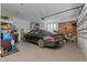 Well-organized two-car garage featuring epoxy flooring, ample storage, and a clean, modern design at 775 Sagamore Dr, Louisburg, NC 27549