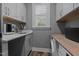 This laundry room features new appliances, counter space, and plenty of storage at 775 Sagamore Dr, Louisburg, NC 27549