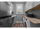 This laundry room features new appliances, counter space, and plenty of storage at 775 Sagamore Dr, Louisburg, NC 27549