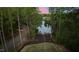 Beautiful waterfront property with a path leading to a private dock, perfect for enjoying lake activities at 775 Sagamore Dr, Louisburg, NC 27549