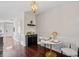 Cozy dining area near the kitchen with a modern table and chairs, perfect for intimate meals at 7822 Allscott Way, Raleigh, NC 27612