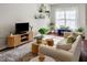 Bright and airy living room with stylish decor and natural light at 7822 Allscott Way, Raleigh, NC 27612