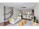 Open living space with hardwood floors flowing into the kitchen, perfect for entertaining at 7822 Allscott Way, Raleigh, NC 27612