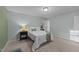 Comfortable bedroom with neutral tones, carpet, and natural light from the window at 801 Silver Leaf Pl, Raleigh, NC 27609