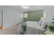Relaxing bedroom with soft carpet, a queen bed, and ample closet space at 801 Silver Leaf Pl, Raleigh, NC 27609