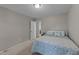 Bedroom featuring carpet and a comfortable bed with soft, patterned bedding at 801 Silver Leaf Pl, Raleigh, NC 27609