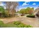 Large paved area provides ample space for parking and recreation in this home's backyard at 806 S Second St, Smithfield, NC 27577