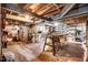 Unfinished basement area featuring exposed beams and ample storage space at 806 S Second St, Smithfield, NC 27577