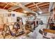 Unfinished basement with exposed ductwork and concrete floors, ideal for storage or workshop at 806 S Second St, Smithfield, NC 27577