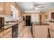 Functional kitchen with granite counters, ample cabinetry, and a convenient center island at 806 S Second St, Smithfield, NC 27577