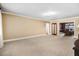 Spacious living room with neutral carpet, a large open space, and great natural light at 806 S Second St, Smithfield, NC 27577