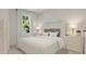 Light and airy bedroom with neutral tones, bright windows, and simple, elegant decor at 87 Glencoe Ln, Zebulon, NC 27597