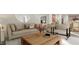Cozy living room with stylish decor, neutral colors and lots of natural light at 87 Glencoe Ln, Zebulon, NC 27597