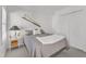 Bedroom featuring gray bed and white walls and trim at 8721 Attingham Dr, Raleigh, NC 27615