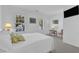 Cozy bedroom with white walls, plush carpet, and natural light from three windows at 8721 Attingham Dr, Raleigh, NC 27615