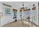 Bright breakfast nook featuring cozy seating, natural light, and a view of the backyard at 8721 Attingham Dr, Raleigh, NC 27615