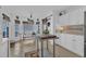 Bright kitchen featuring a breakfast nook, modern appliances, and a stylish design at 8721 Attingham Dr, Raleigh, NC 27615