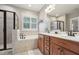 Bathroom with a glass enclosed shower, soaking tub, double vanity and tiled floors at 904 Coral Bell Dr, Wake Forest, NC 27587