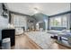 Spacious bedroom with hardwood floors, neutral rug, fun decor, and great natural light at 904 Coral Bell Dr, Wake Forest, NC 27587