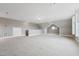 Spacious bonus room with neutral carpet and paint, offering versatile living space at 904 Coral Bell Dr, Wake Forest, NC 27587