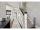 Hallway with hardwood floors and staircase at 904 Coral Bell Dr, Wake Forest, NC 27587