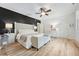 Spacious main bedroom with hardwood floors, ceiling fan and ensuite at 904 Coral Bell Dr, Wake Forest, NC 27587