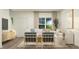 Bright living room featuring comfortable seating, contemporary decor, and ample natural light at 92 Glencoe Ln, Zebulon, NC 27597